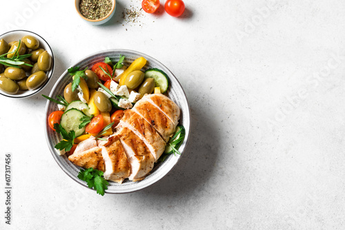 Grilled chicken fillet and fresh greek salad