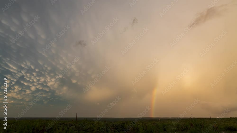 Mammatus and rainbow display ensues following the passage of a tornado-producing supercell in southern Texas. Mammatus and rainbow display ensues following the passage of a tornado-producing supercell in southern Texas.