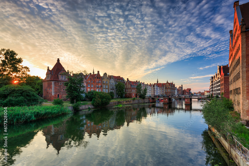 Obraz premium The Main Town of Gdansk by the Motlawa river at sunset, Poland