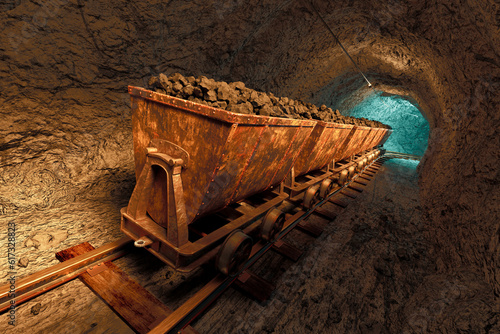 Coal mine carts or wagons slowly moving through narrow underground tunnel.