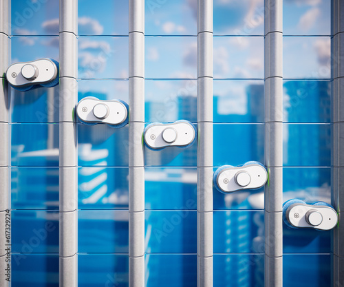Smart automatic robots clean big glass windows. Big building windows washing.