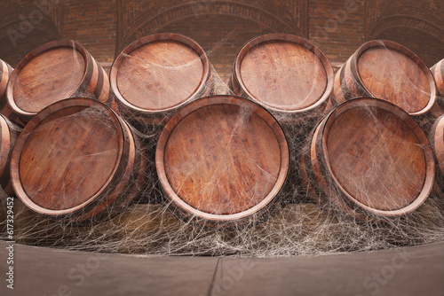 Wooden barrels for storing wine or whiskey in the dark basement or cellar.