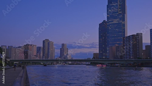 Evening Tokyo, Tsukuda, Toyosu skyscrapers and bridge the Sumida River photo