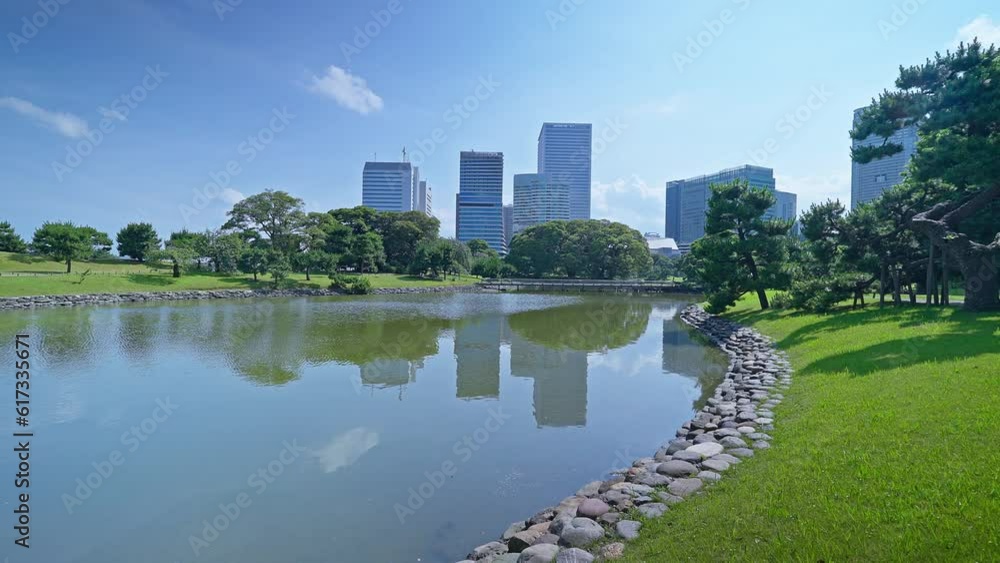 Beautiful Japanese traditional garden and pond with skyscrapers Tokyo Beautiful Japanese traditional garden and pond with skyscrapers Tokyo