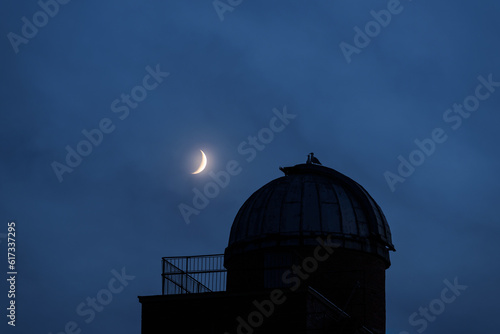 ASTRONOMICAL OBSERVATORY - Observation object against the background of the moon
