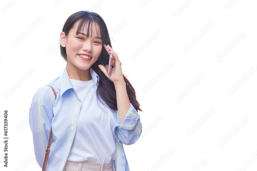 Portrait professional business young Asian woman is walking to office or work place while she holds talks to customer on the phone with smartphone isolated on white background. Portrait professional business young Asian woman is walking to office or work place while she holds talks to customer on the phone with smartphone isolated on white background.