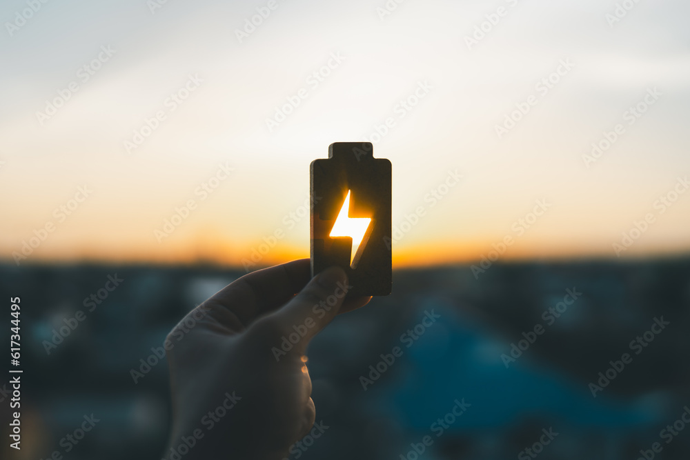 Technology battery high power electric energy with a connected charging cable. Battery to electric cars and mobile devices with clean electric, Green renewable energy battery storage future. - obrazy, fototapety, plakaty 