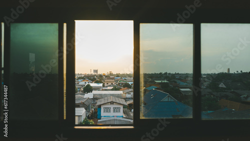 Urban Window Views: Captivating Real Estate Photography for Sale.