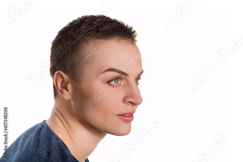 A portrait of a beautiful woman in short black hair against white background.