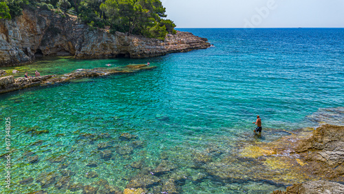 Aerial view of  Famous Cyclone beach near Pula. Rocks in clear water. Istria. Croatia