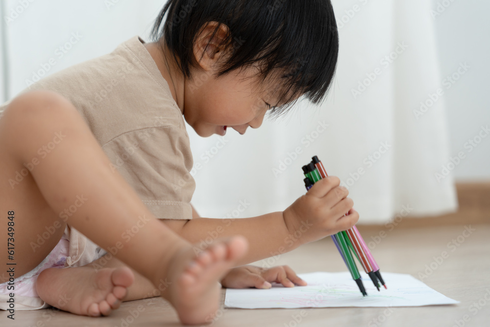 Happy Asia children playing learning paint on paper. Activity, development, IQ, EQ, meditation, brain, muscles, essential skills, family having fun spending time together. Holiday Happy Asia children playing learning paint on paper. Activity, development, IQ, EQ, meditation, brain, muscles, essential skills, family having fun spending time together. Holiday