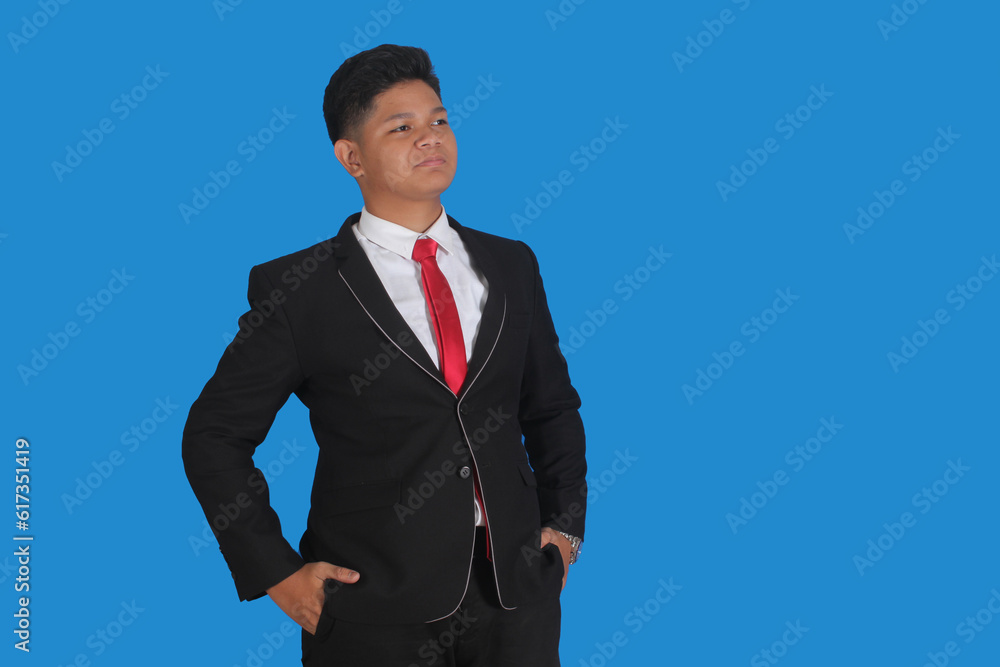 Asian man with serious expression wearing black suit
Asian man with serious expression wearing black suit