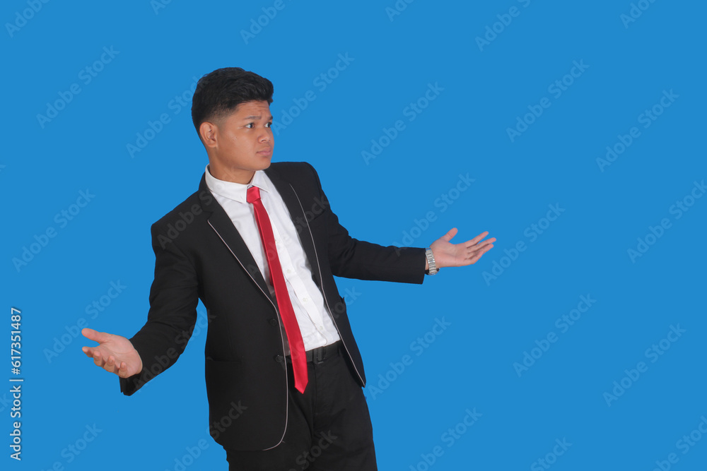 Mature Asian man standing and cheering while showing the mobile phone he is holding
Mature Asian man standing and cheering while showing the mobile phone he is holding