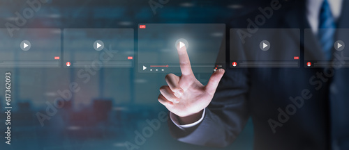Online business, live video streaming concept. Businessman making video of business 4.0. Man using hand for online stream on virtual screen, watching on internet, live, show, podcast, online content.