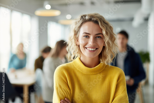 A young blonde woman in yellow sweater standing in office looking at camera. AI Generative