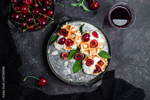 Belgian sweet waffles with cream cheese and cherries