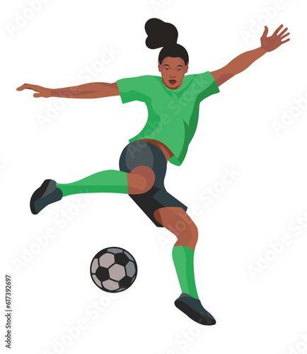 Black women's football girl player jumps up preparing to kick the ball with foot