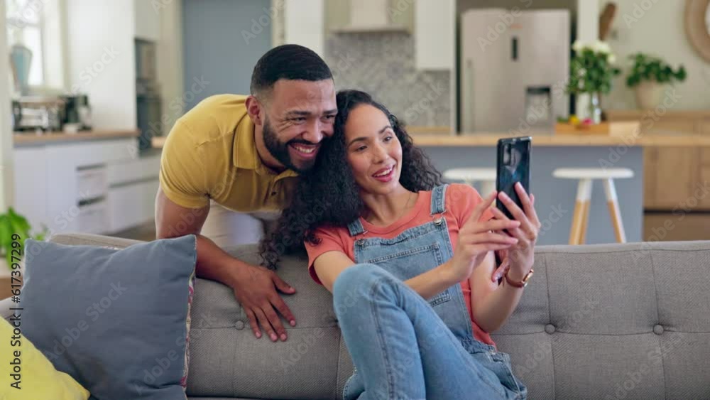 Couple, sofa and greeting on video call in apartment for communication and social talk or smile. Online, wave and cellphone with man and woman in living room with laughter or conversation, happiness. Couple, sofa and greeting on video call in apartment for communication and social talk or smile. Online, wave and cellphone with man and woman in living room with laughter or conversation, happiness.