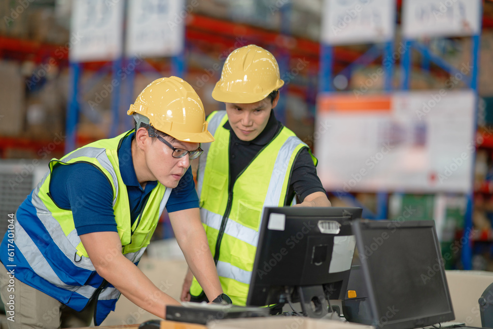 Managers and employees are counting stocks in a warehouse. Managers and employees are counting stocks in a warehouse.