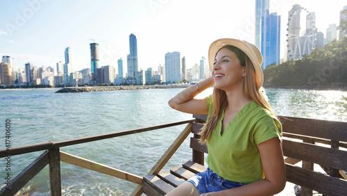 Photography Attractive young fashion woman enjoying Balneario Camboriu city feelings