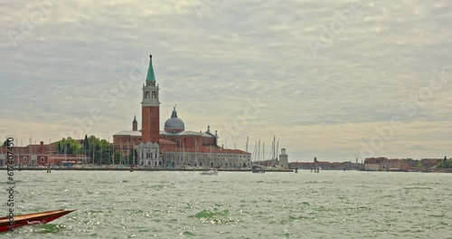 Gondolas by Saint Mark square with San Giorgio di Maggiore church in the background in Venice Italy
