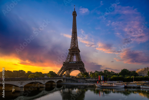 View of Eiffel Tower and river Seine at sunrise in Paris, France. Eiffel Tower is one of the most iconic landmarks of Paris © Ekaterina Belova