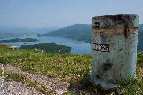 Slano jezero Vidikovac Montenegro lake with rubbish bin photo