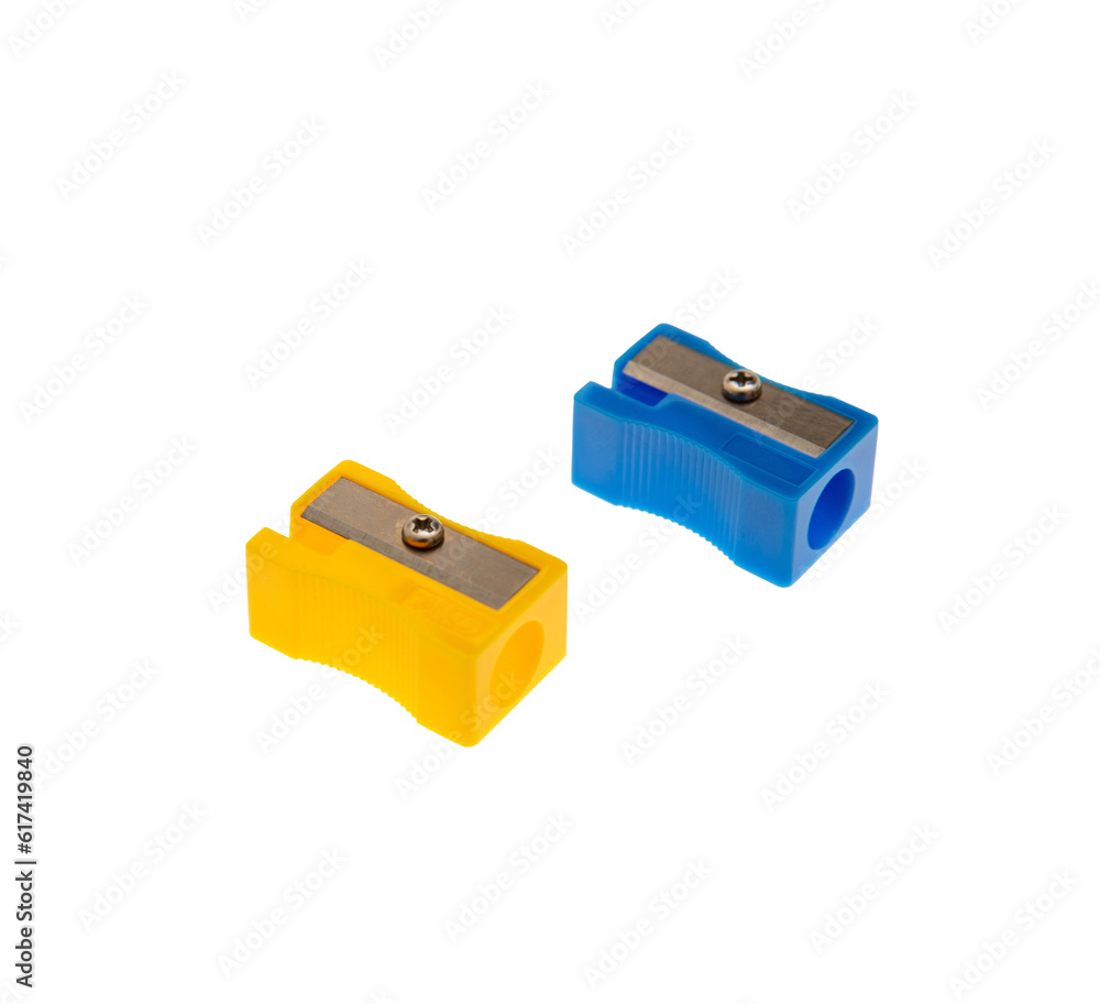 Blue and yellow pencil sharpeners isolated on transparent, closeup, PNG, School supply Blue and yellow pencil sharpeners isolated on transparent, closeup, PNG, School supply