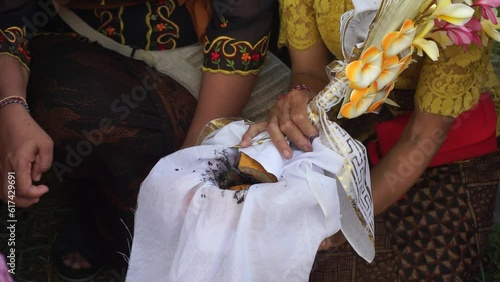 Ngaben or cremation ceremony in Bali, Indonesia. It is performed to release the soul of a dead person. The stage of manifesting the soul into the Ngaben ritual means. photo