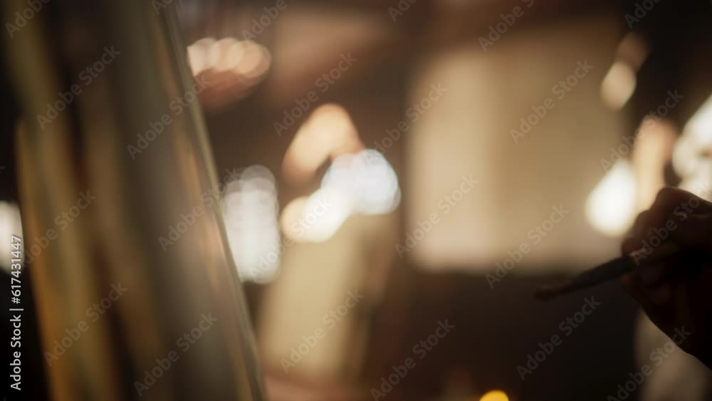 Close Up on Male Painter Hand Painting the Mona Lisa with Gentle Brush Movement. Details of the Famous Painting Being Drawn by its Creator. Pure Talent and Mastery of High Art, Everlasting Beauty