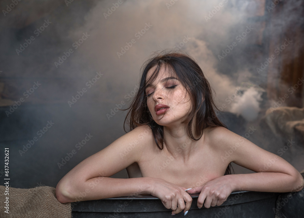 Portrait of a girl relaxing in a steam bath.