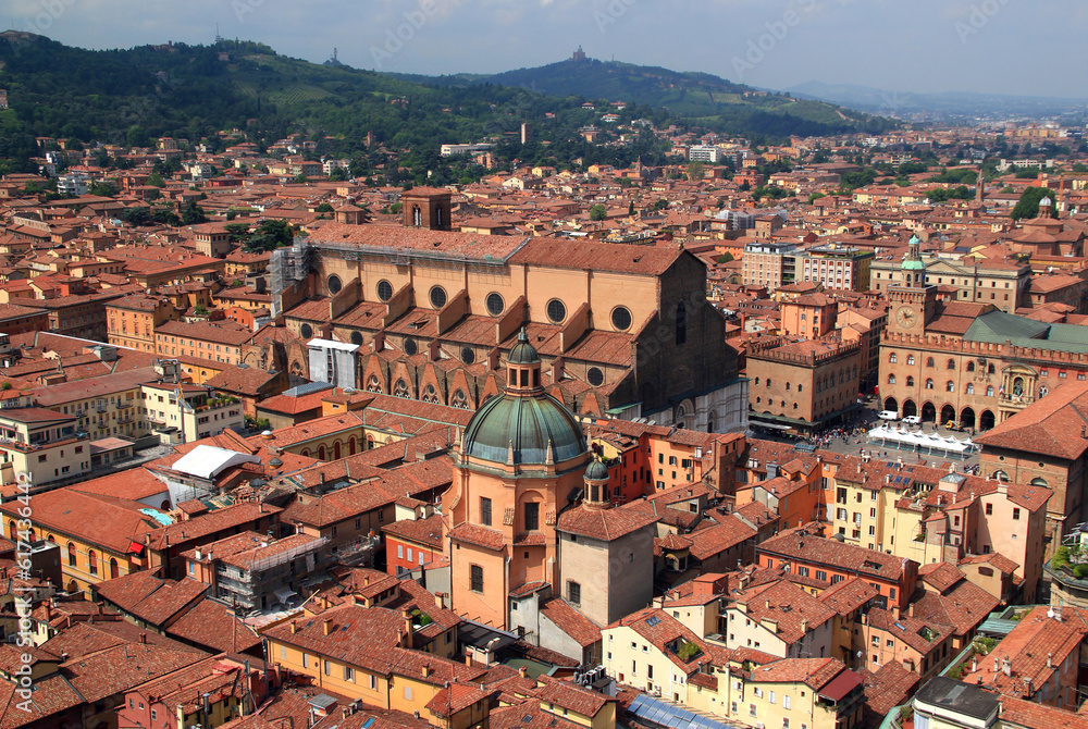 Photo of a view of the historic part of the city with Basilica di San Petronio, Piazza Maggiore and church in Bologna, Emilia-Romagna, Italy