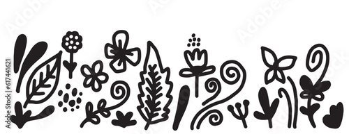 Black silhouettes of grass, flowers and herbs isolated on white background. Hand drawn sketch flowers. © tedi