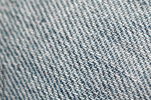 Denim jeans texture. Close up of jeans fabric textile background. Selective focus