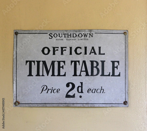 Old fashioned antique time table sign. Railway signs.