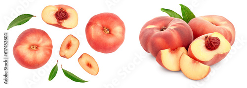 Ripe chinese flat peach fruit and half with leaf isolated on white background. Top view. Flat lay