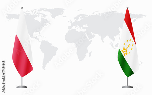 Poland and Tajikistan flags for official meeting