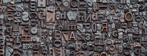 Canvas Print Letterpress background, close up of many old, random metal letters with copy spa