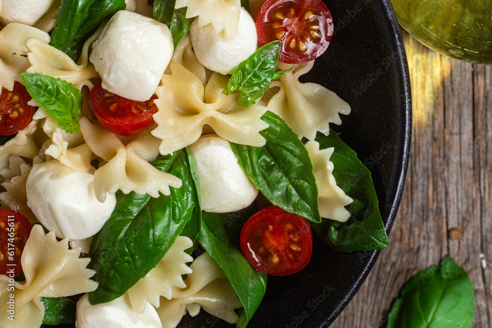 Pasta with tomato, mozzarella and basil Pasta with tomato, mozzarella and basil