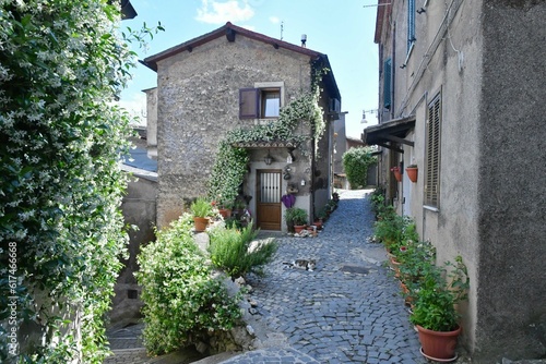 A street between old houses Subiaco  a medieval town in the province of Rome  Italy.