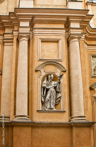 Sculpture on the facade of St. Martin's Church in Warsaw,  Poland photo