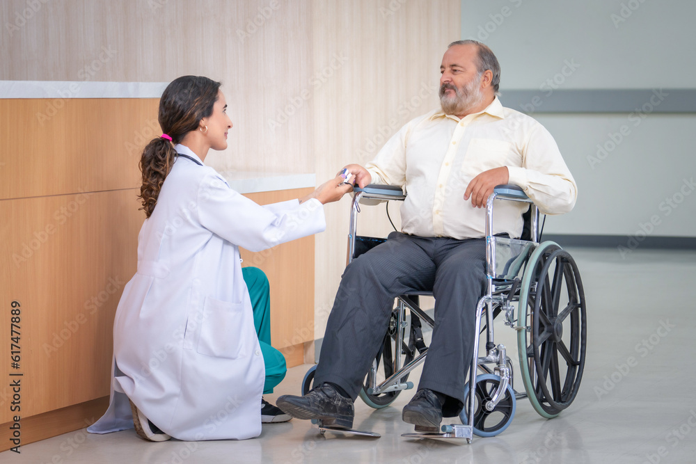 Professional Medical Doctor diagnosing and giving advice to the elderly patient at hospital. Professional Medical Doctor diagnosing and giving advice to the elderly patient at hospital.