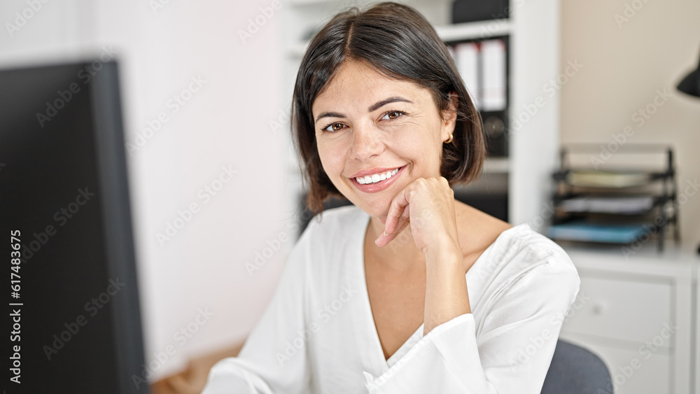 Young beautiful hispanic woman business worker using computer working at office Young beautiful hispanic woman business worker using computer working at office