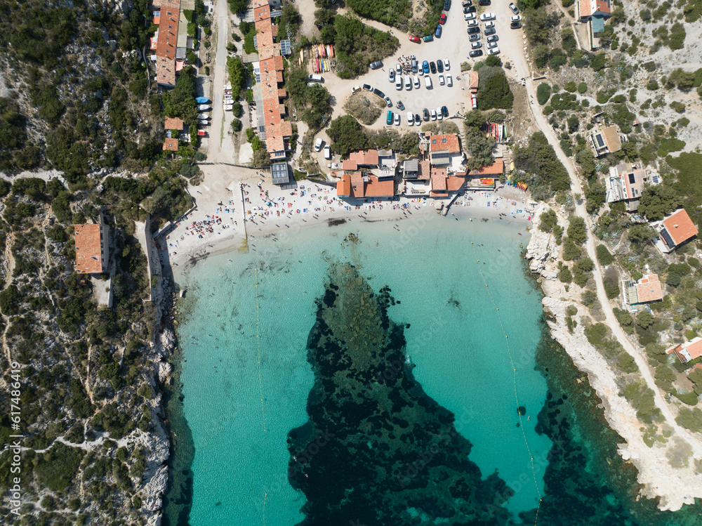Aerial drone photo of a beach and water at the the calanques at Marseille.