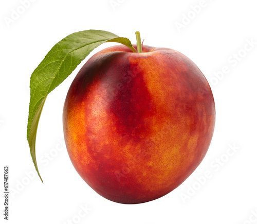 Nectarine peach with green leaf isolated on white with clipping path included