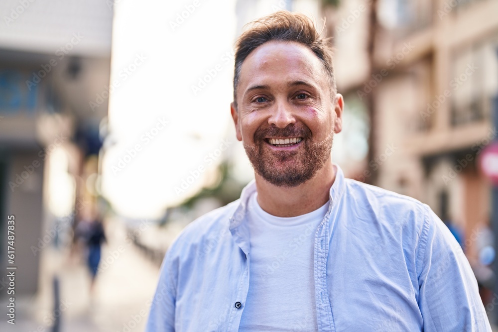 Young caucasian man smiling confident standing at street Young caucasian man smiling confident standing at street