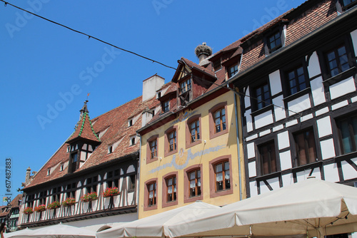 medieval buildings at market street in obernai in alsace (france)