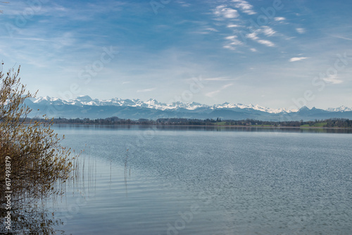 Lake Pfaeffikersee with the mountains in the background in Zurich in Switzerland