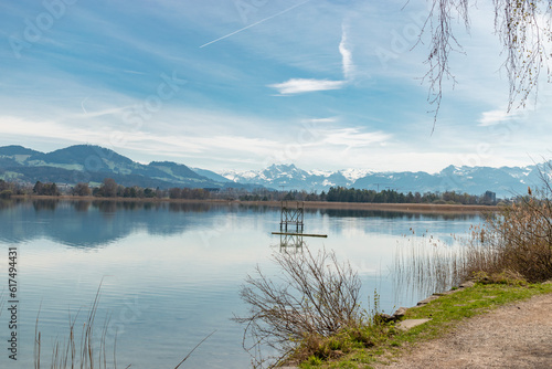 Lake Pfaeffikersee with the mountains in the background in Zurich in Switzerland