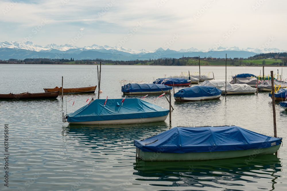 Small boats on the lake Pfaeffikersee in Zurich in Switzerland